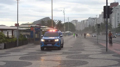 RIO DE JANEIRO, BRAZIL - 04/12/2020: Police Car during COVID-19 Crisis, 4K Stock Footage