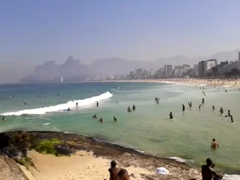 Rio de Janeiro, Brazil-08/03/2014: People having a bath at the beach Stock Footage 146240193