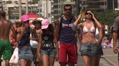Rio de Janeiro: Compression Shot of People Walking On Boardwalk (2) Stock Footage 46973327