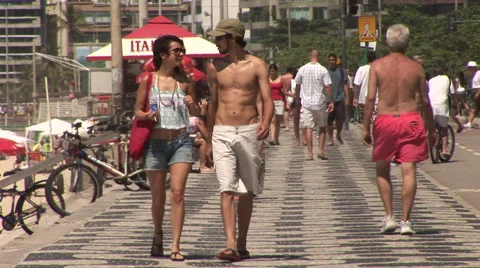 Rio de Janeiro: Compression Shot of People Walking On Boardwalk (3) Stock Footage 46973367
