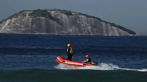 Rio de Janeiro: Lifeguards on Motor Life Boat Speed Down on Ipanema Beach Stock Footage 45331749