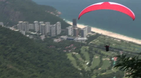 Rio de Janeiro: Paraglider flying over the city Stock Footage 47014601