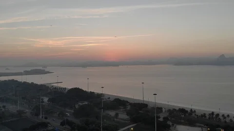 Rio de janeiro sunrise birds fly by Stock Footage