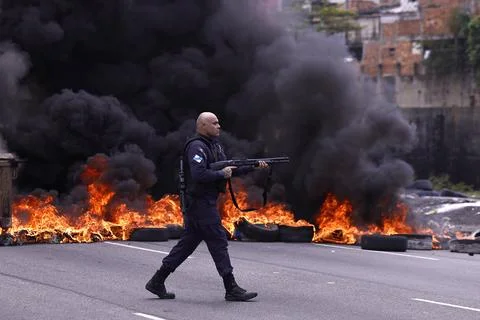 Rio favela protests break out after 5-year-old injured in police raid, Rio De Ja Stock Photos