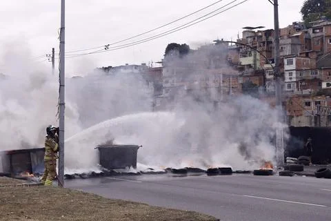 Rio favela protests break out after 5-year-old injured in police raid, Rio De Ja Stock Photos