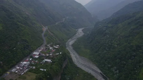 Rio verde, Ecuador, 3-2-2022: the highway is passing through a small village Stock Footage 170028183