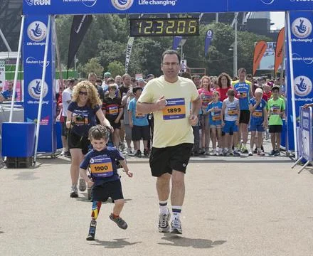 Rio Woolf 5 Taking Part In The National Lottery Family Run At The Olympic Park. Fotos de archivo