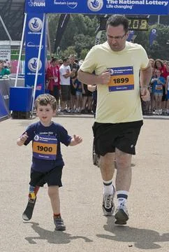Rio Woolf 5 Taking Part In The National Lottery Family Run At The Olympic Park. Fotos de archivo
