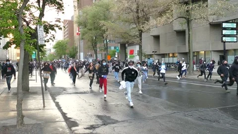 Rioters running to police Stock Footage 132556246