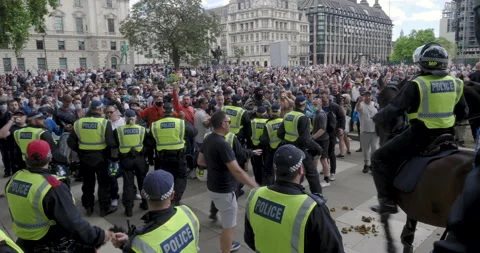 Riots against Far-right crowd and Hooligans in Parlament Square, London Stock Footage 132609783
