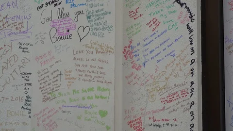 RIP Mourners write on wall, David Bowie death - January 2016, London (4K) Stock Footage 119935752