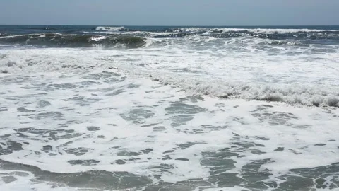 Rip tides form in an active and rough Atlantic Ocean Stock Footage 281852692