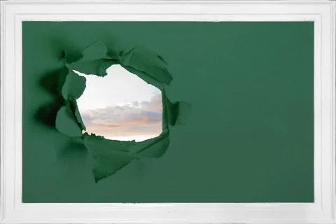 Rip on wall showing bright sky Ilustración de archivo