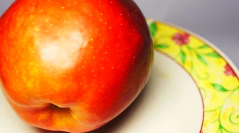 A ripe apple on a plate. Rotation view Stock-Footage 44250007