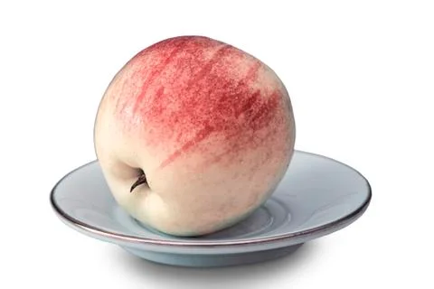 Ripe Apple on the table on a plate. Stock Photos
