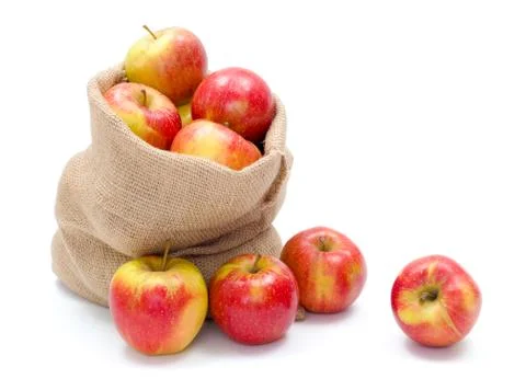 Ripe apples in burlap sack Foto stock