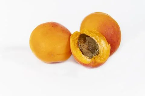 Ripe apricots on white background, composition Stock Photos