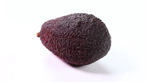 A ripe avocado close up on white background, rotating Stock Footage 318812046