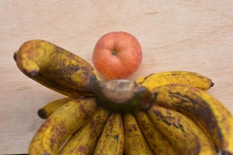 Ripe bananas with apple rustic flat lay Fotos de archivo