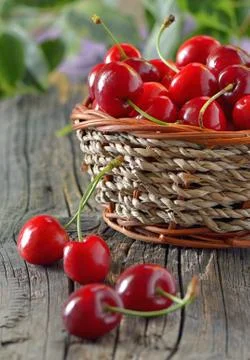 Ripe cherries in a basket Free Stock Photos