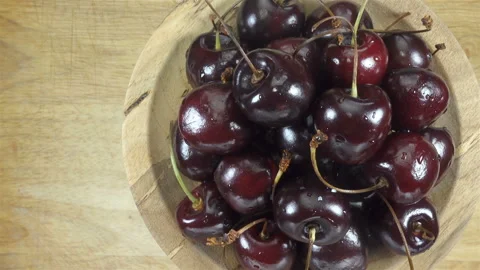 Ripe cherries in a plate Stock Footage 150157352