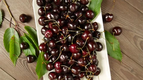 Ripe cherries on a plate. Stock Footage 297365192