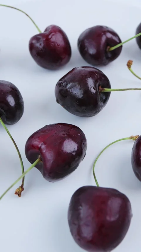 Ripe cherries rotate in closeup. Fruit food presentation. 4k video Video stock 342964219