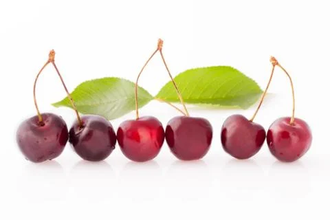 Ripe Cherries In Row Stock Photos