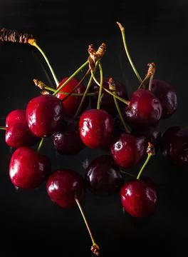 Ripe cherries on a solid background, healthy vegetarian food. Beautiful 库存照片