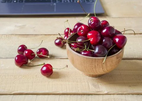 Ripe cherries on the table. Stock Photos
