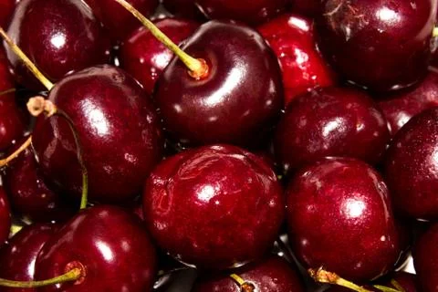Ripe cherry background.Large cherry fruit. Stock Photos