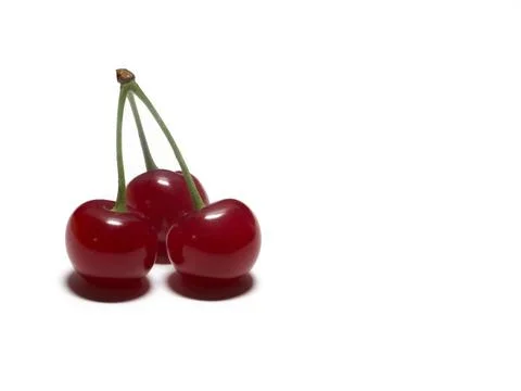 Ripe cherry fruit closeup isolated on a white background Stock Photos