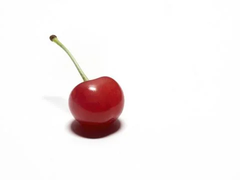 Ripe cherry fruit closeup isolated on a white background Stock Photos