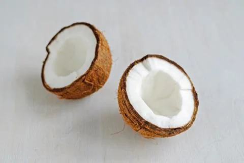 Ripe coconuts on grey background Foto stock