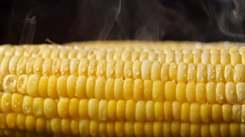 Ripe ears of corn in boiling water with vitamins for good healthy. Stock Footage 130932197
