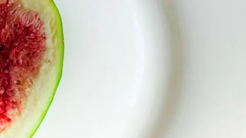 Ripe figs on a white background. Close-up, selective focus Stock Photos