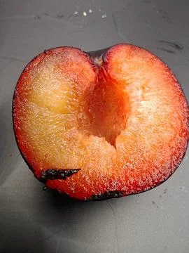 Ripe fruit half Stock Photos