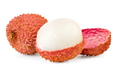 Ripe lychee cleaned half on a white, isolated. Stock Photos