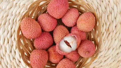 Ripe lychees in a basket. Stock Footage 247956529