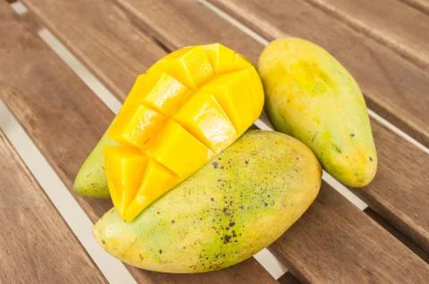 Ripe mango in a pile of mango. Stock Photos