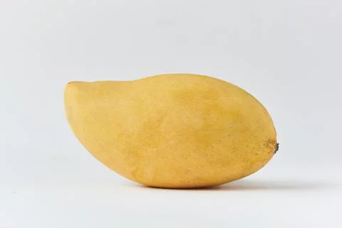 A  ripe mango on white background Stock Photos