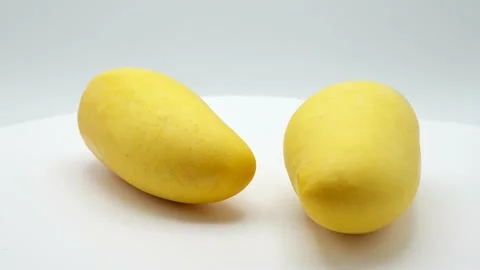 Ripe Mango On White Background Rotated. Vidéo 198186944