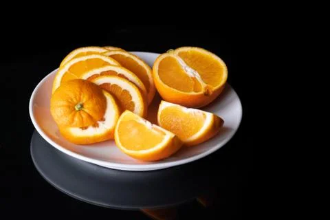 Ripe orange isolated on black background Clipping Path Stock Photos