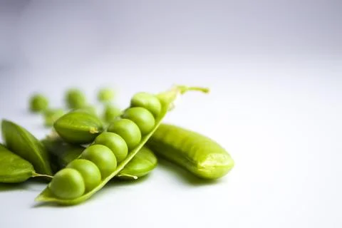 Ripe pea vegetable. Isolated on white background Stock Photos