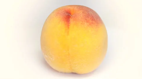 Ripe  peach fruit rotating on white background Stock Footage 35568596