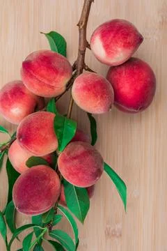 Ripe peach fruit on the table. Stock Photos