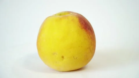 Ripe peach rotates on its axis Stock Footage 159022673