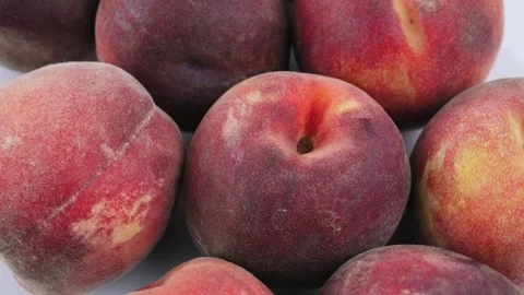Ripe peaches closeup frame. Peaches fresh harvest, juicy fruit for healthy 4k Video stock 342964000