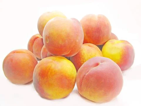 Ripe peaches heap Stock Photos