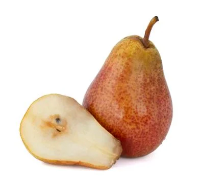 Ripe pear with a stem from the tree on which it grew and cut off the other ha Stock Photos